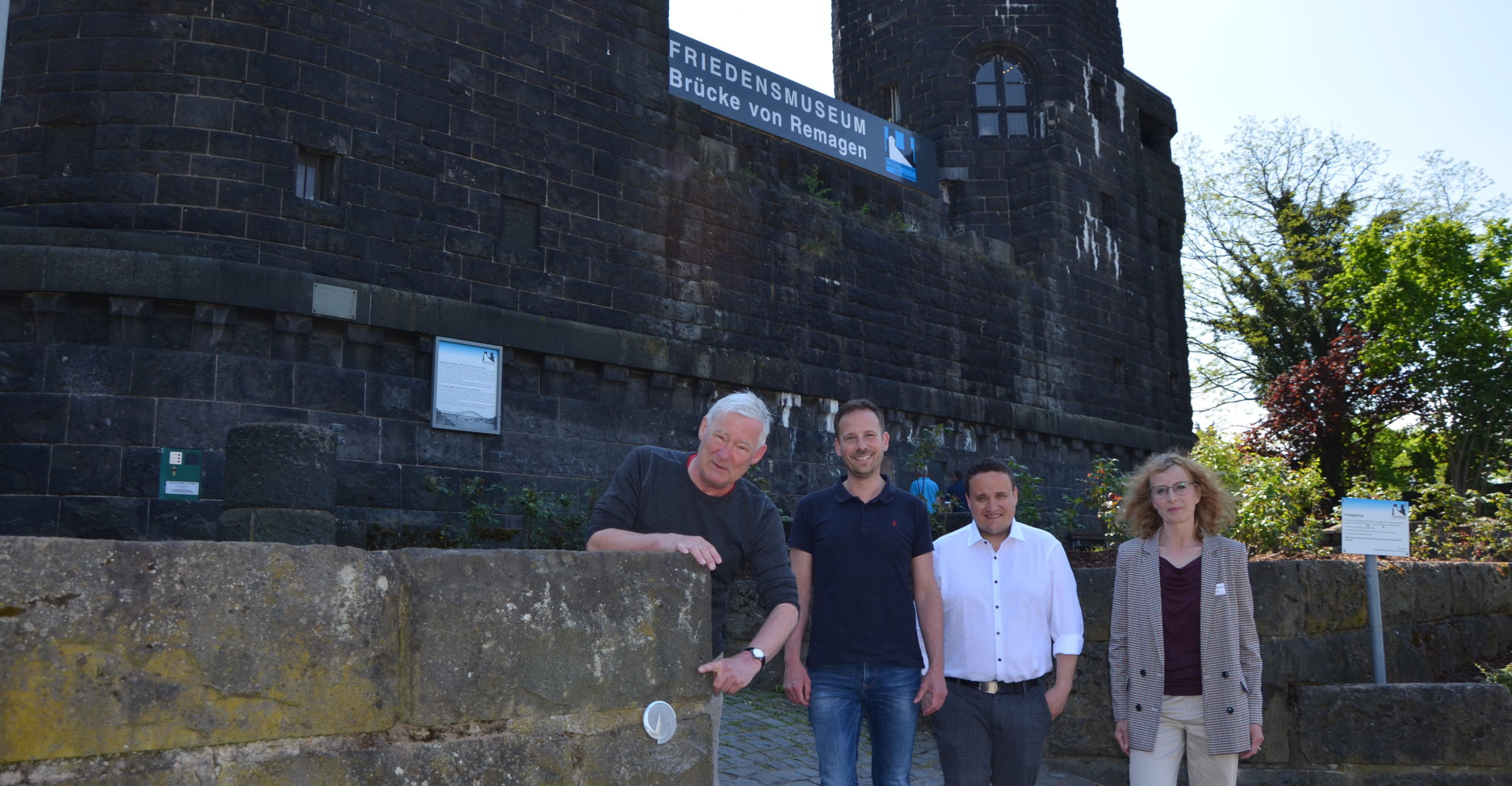 From left to right: Volker Thehos, Peace Museum Board Member,Björn Ingendahl, Mayor of Remagen, Chance Williams, Project Manager LRE Foundation, and Anke Sultan, Peace Museum Board Member
