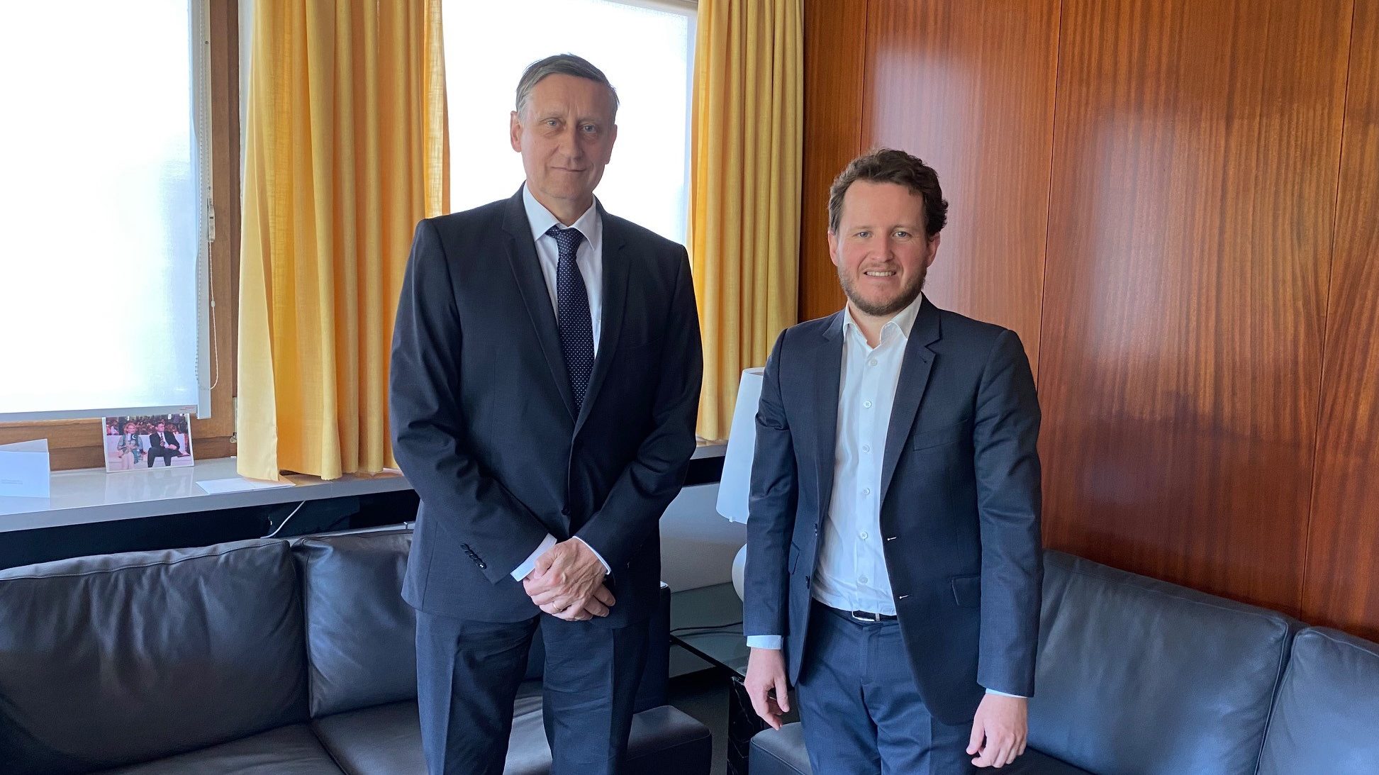 Two men standing next to each other in an office: Ambassador Dr Cyrill Nunn and LRE Foundation Managing Director Rémi Praud